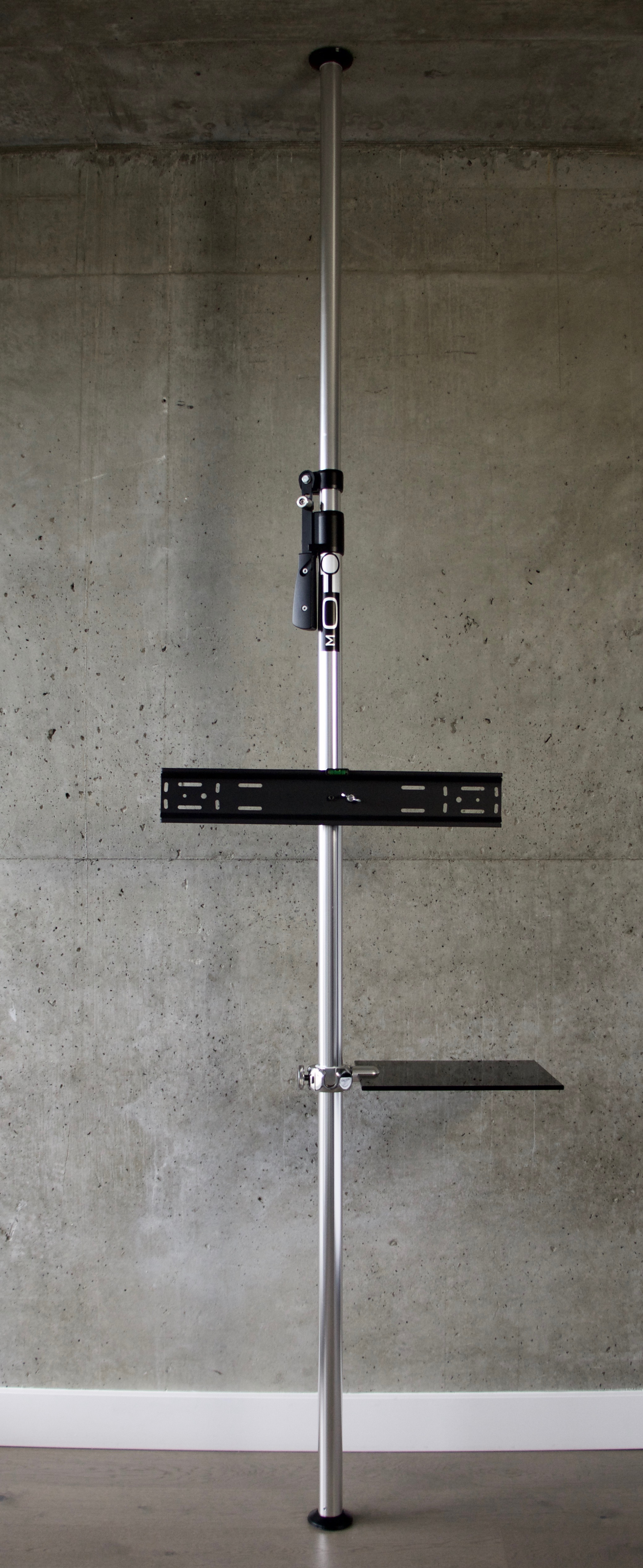 Floor-to-ceiling TV and monitor pole mount with one shelf by MOFO Pole in silver